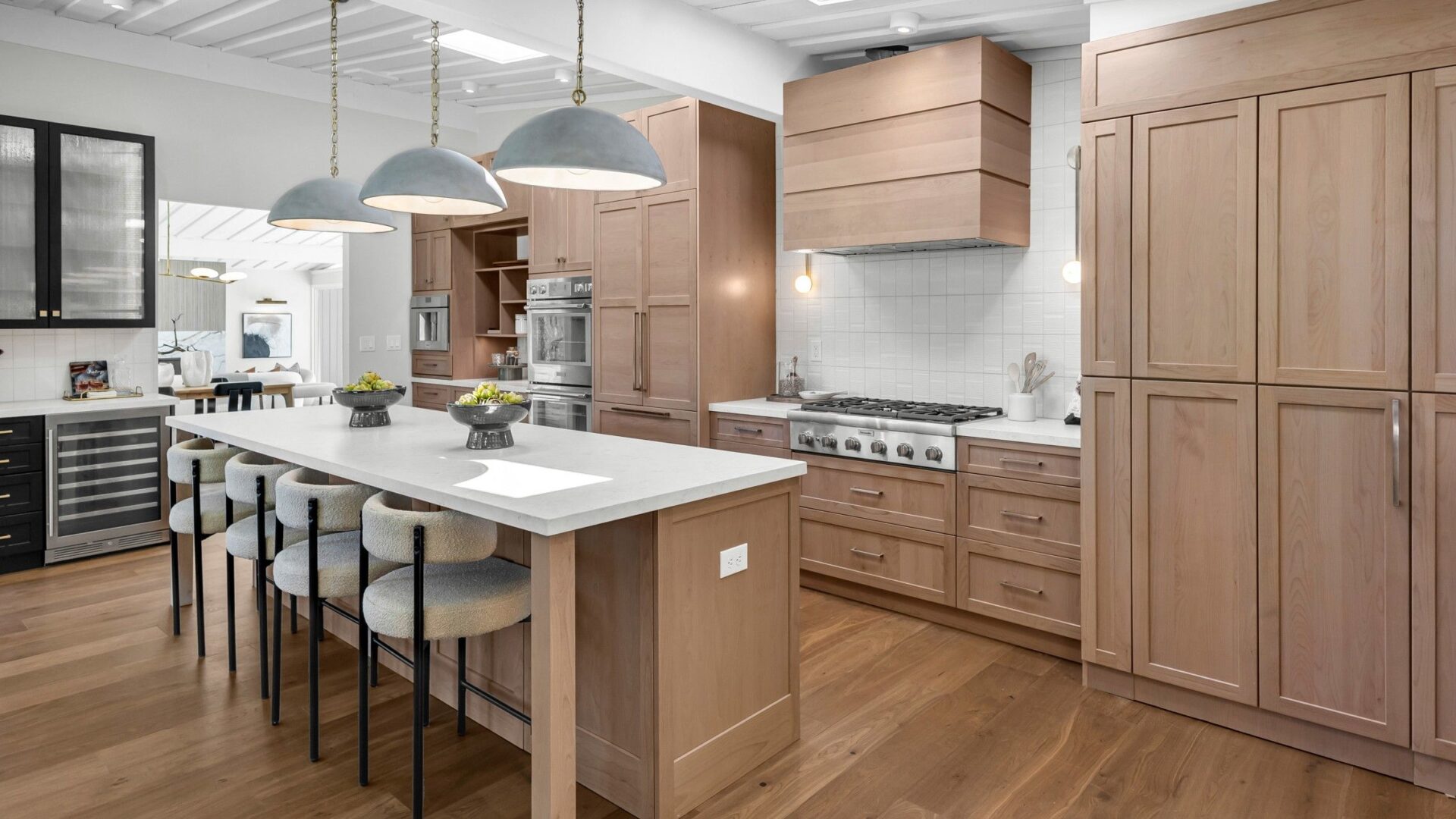 Kitchen with island and alder wood cabinetry