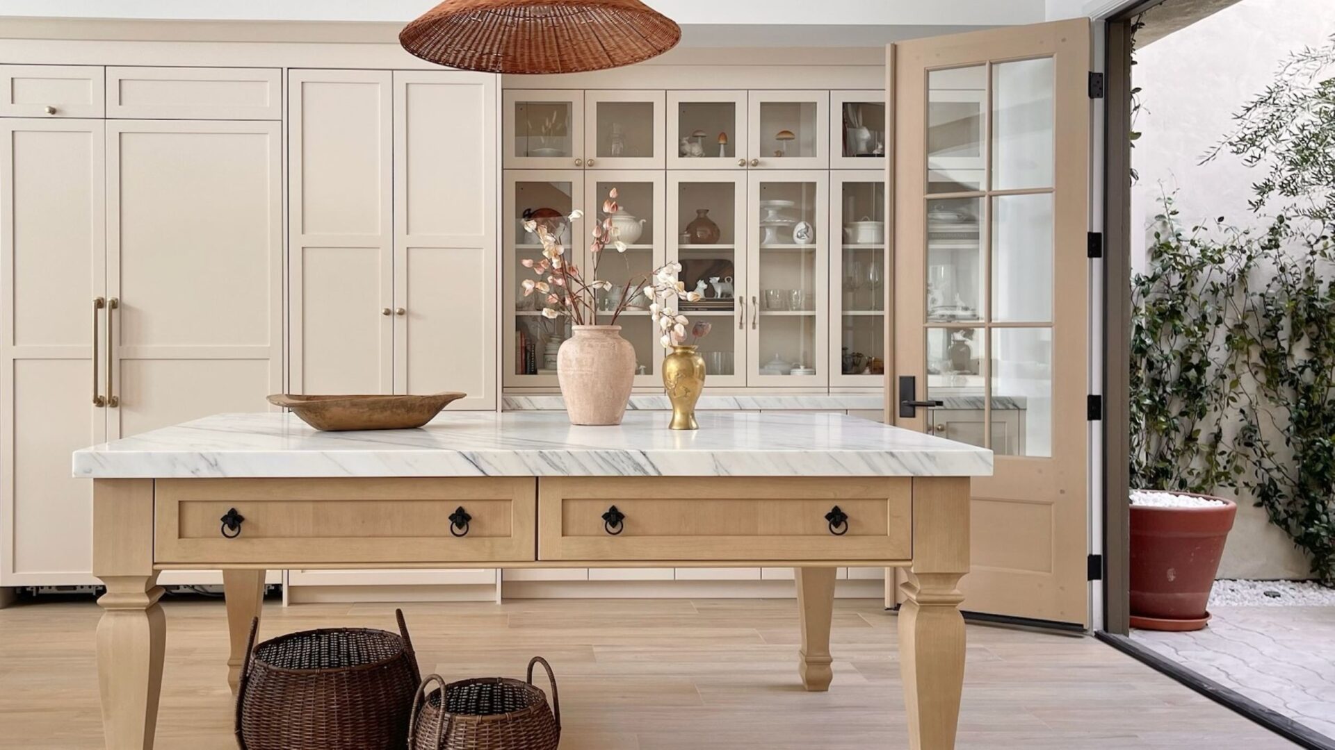 Columbia Cabinets | Home | custom cabinetry designed for life | view 4 | Warm and inviting kitchen leading to patio