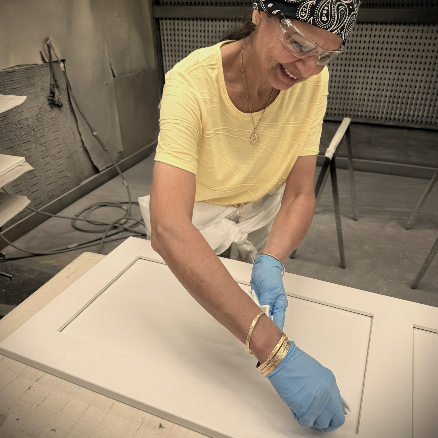 Woman working on Columbia Cabinets